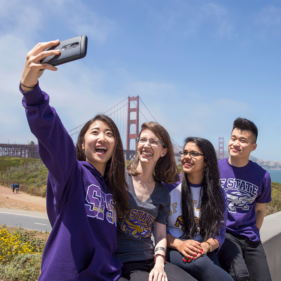 SF State students take a selfie at the Golden Gate Bridge