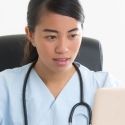 Medical assistant taking an online course