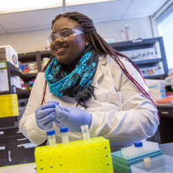 Scientist working with samples in a lab