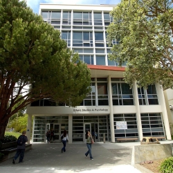 People walking outside of the Ethnic Studies & Psychology building